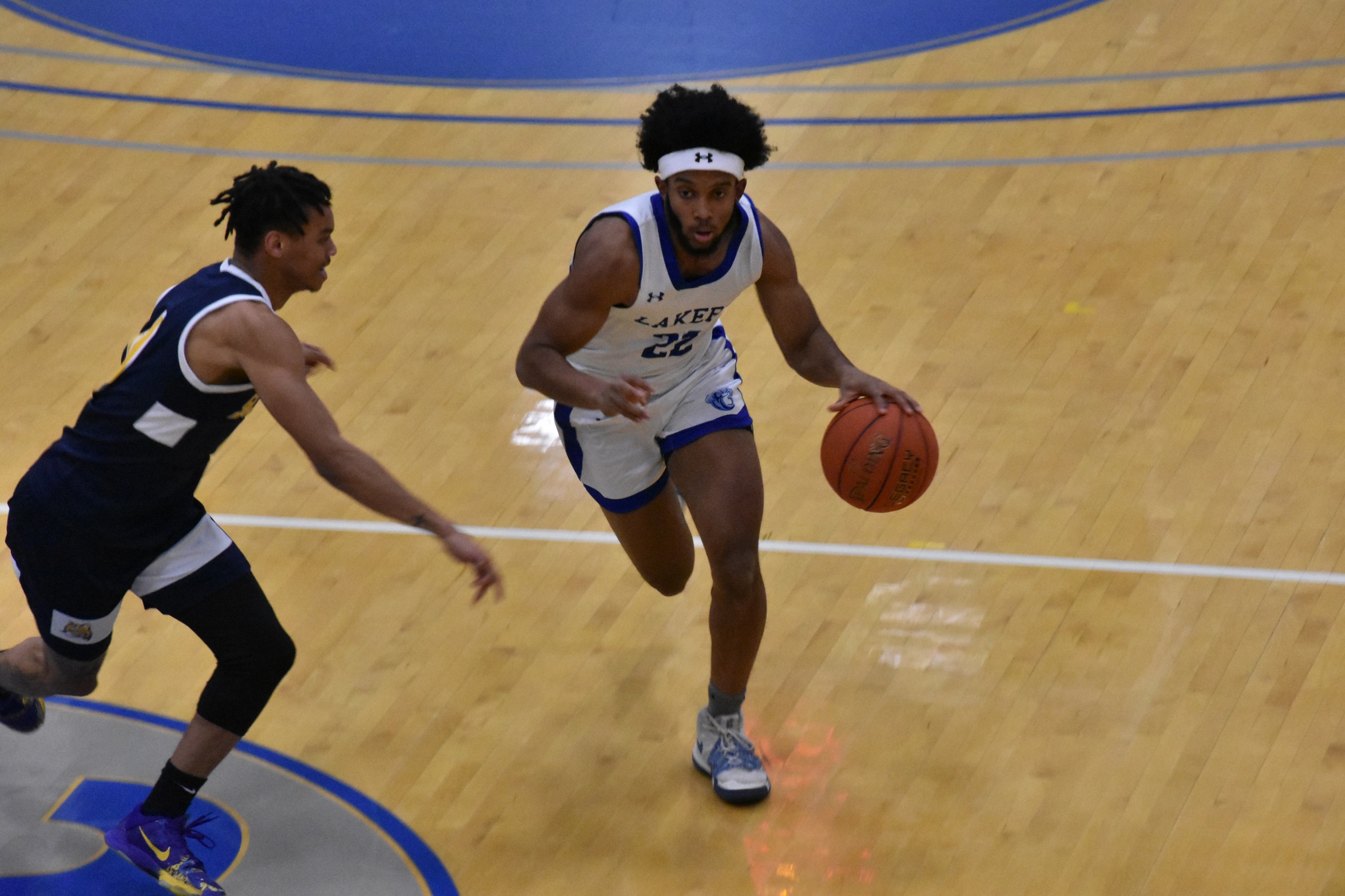 Men's basketball downs Ocelots
