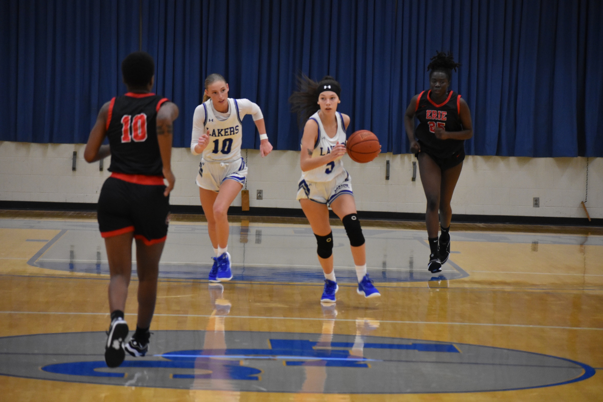 Women's basketball cages Kats